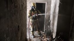 آتش‌سوزی یک ساختمان مسکونی ۶ طبقه در خیابان ولیعصر تهران