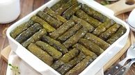 طرز تهیه دلمه برگ مو با رب انار و سس مخصوصش
