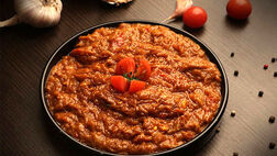 طرز تهیه میرزا قاسمی با بادمجان کبابی و طعم دودی
