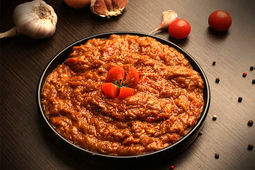 طرز تهیه میرزا قاسمی با بادمجان کبابی و طعم دودی
