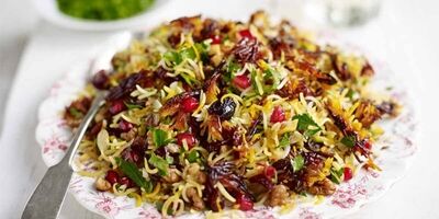 آشنایی با روش تهیه انار پلو با پرک بادام+فوت و فن
