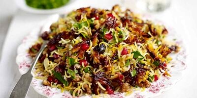 آشنایی با روش تهیه انار پلو با پرک بادام+فوت و فن
