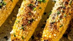 طرز تهیه رسپی بلال پنیری در فر؛یک میان وعده مقوی و خوشمزه
