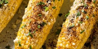 طرز تهیه رسپی بلال پنیری در فر؛یک میان وعده مقوی و خوشمزه
