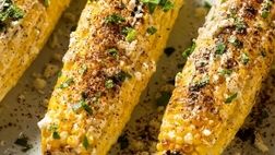طرز تهیه رسپی بلال پنیری در فر؛یک میان وعده مقوی و خوشمزه
